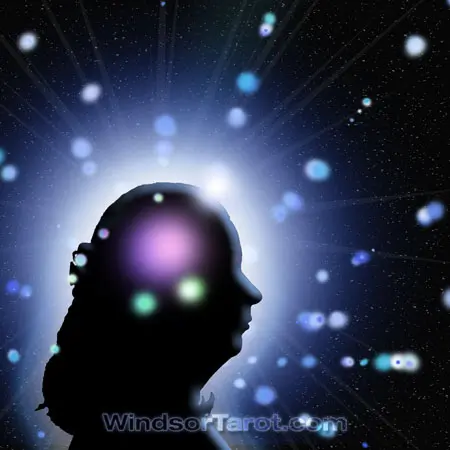 Woman face silhouette with orbs around her head. General reading.