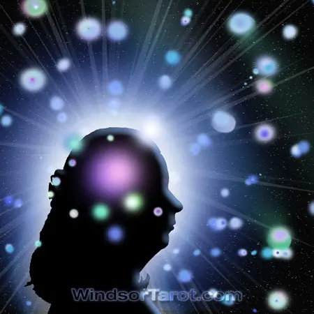 Woman face silhouette with many orbs around her head. In-depth reading.